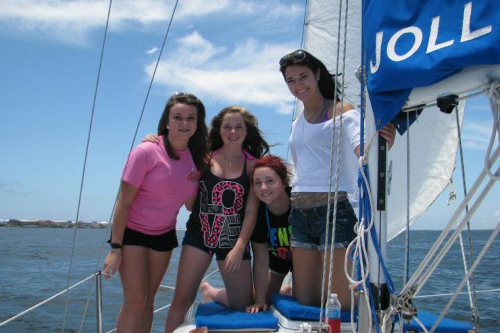 girls enjoying a sail on the Jolly Mon