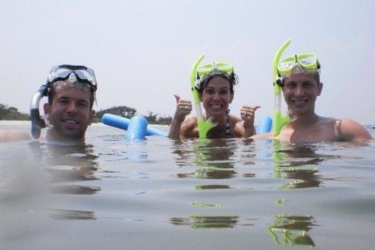 a man and woman swimming in the water